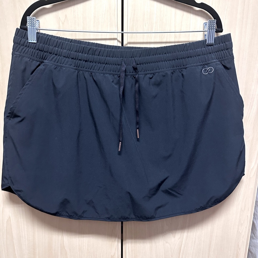 Calia black performance skort with drawstring waist. Size xl like new